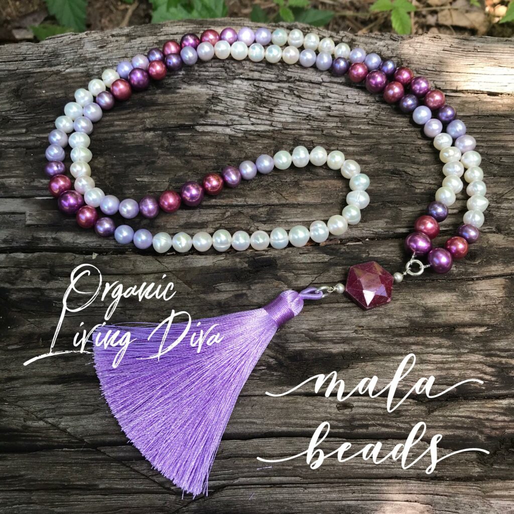 108 Mala bead necklace with colored fresh water pearls, faceted hexagon raw ruby, and lavender tassel.